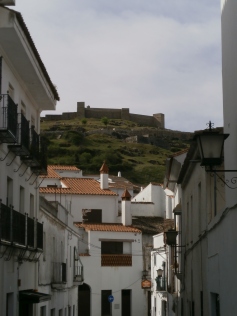 White streets of Aracena and its castel on top of the hill